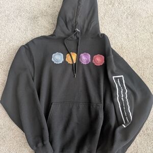 Black Hoodie with Colorful Seals